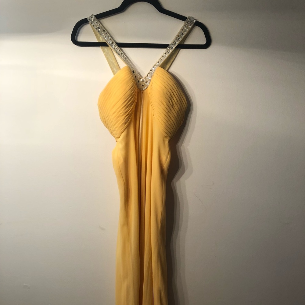 Yellow/gold colored Faviana prom dress